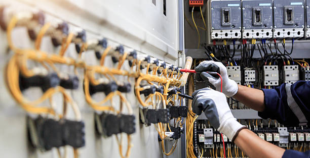 Professional Electrician technician working in East Lake, FL